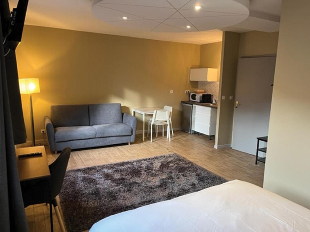 O'Zinc Aparthotel Viviez Bagian luar foto